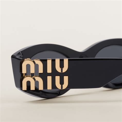 miu miu sungl|Miu Miu glasses.